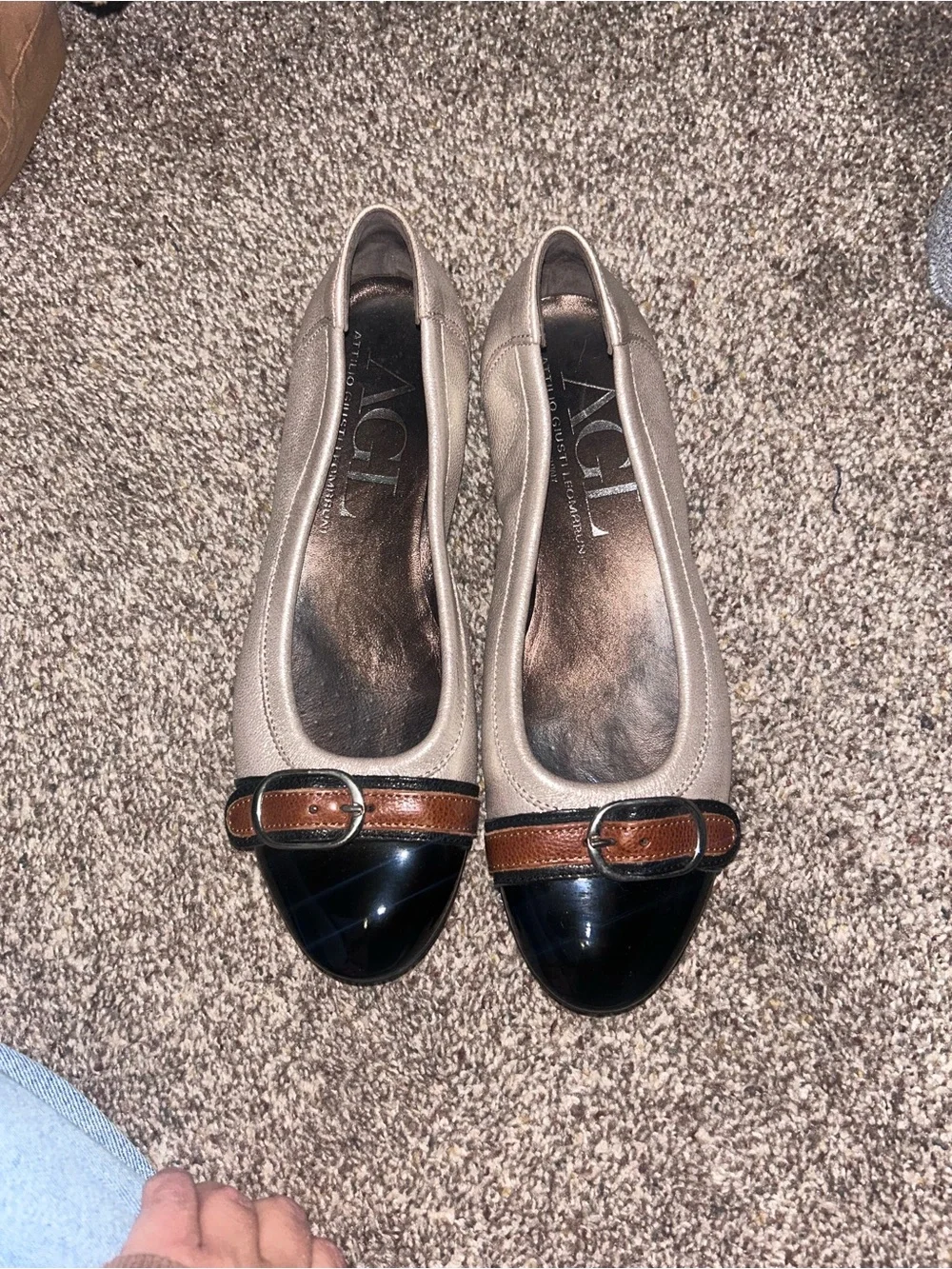 AGL Taupe Leather Flats with Black Patent Cap Toe and Brown Strap Buckle
